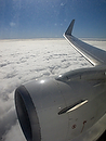 transporte;medios_transporte;transporte_aereo;avion;aviones;avion_volando;naturaleza_y_medioambiente;medioambiental;cielo;climatologia;clima;nubes_blancas;cumulos;luz;iluminacion;contraluz